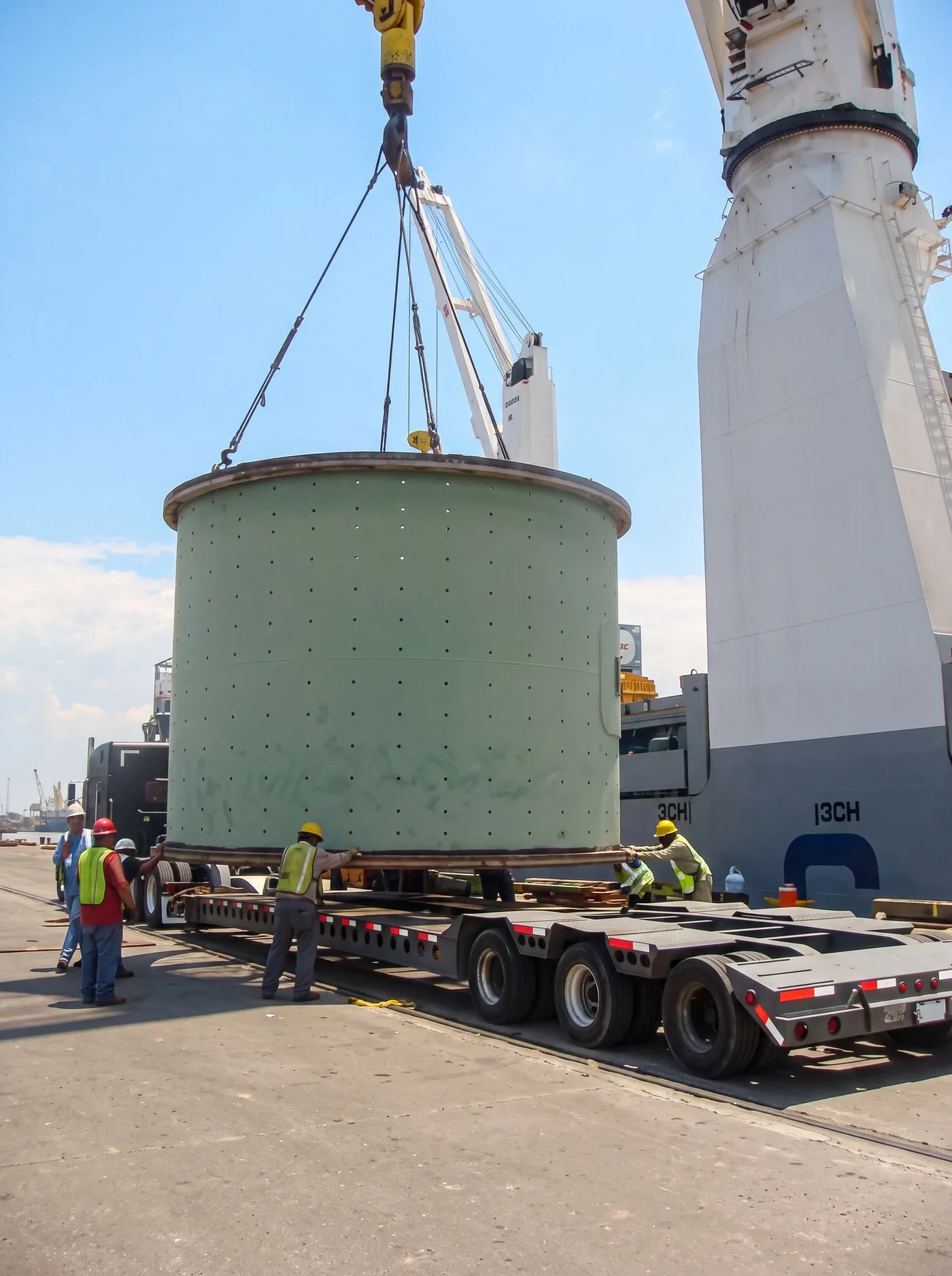 Mining mill shell being loaded at port