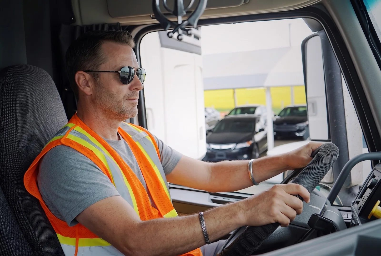 Driver at the wheel of a highway tractor