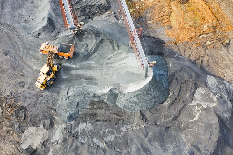 Mining excavator at open pit site