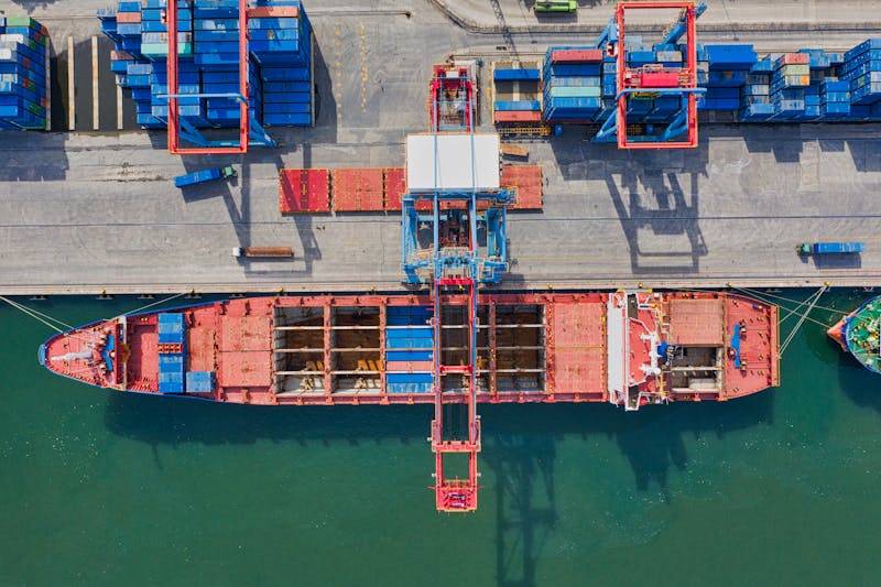 Aerial view of cargo ship at container port