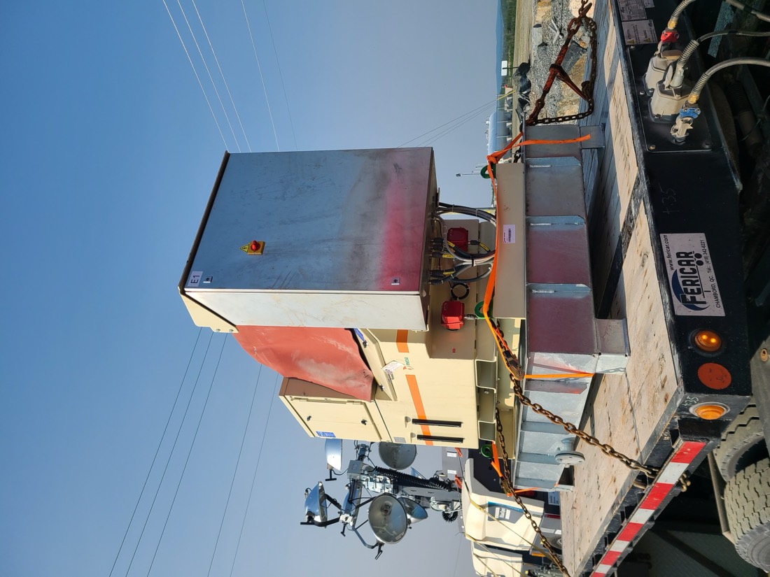 Electrical substation control cabinets / industrial enclosures chain-secured on Fericar flatbed