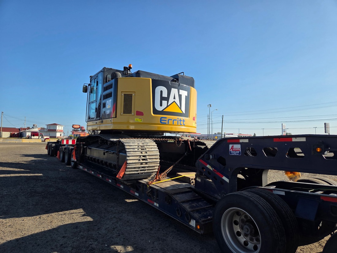 Cat crawler crane (Erritt) chain-secured on Anderson Haulage RGN lowboy trailer