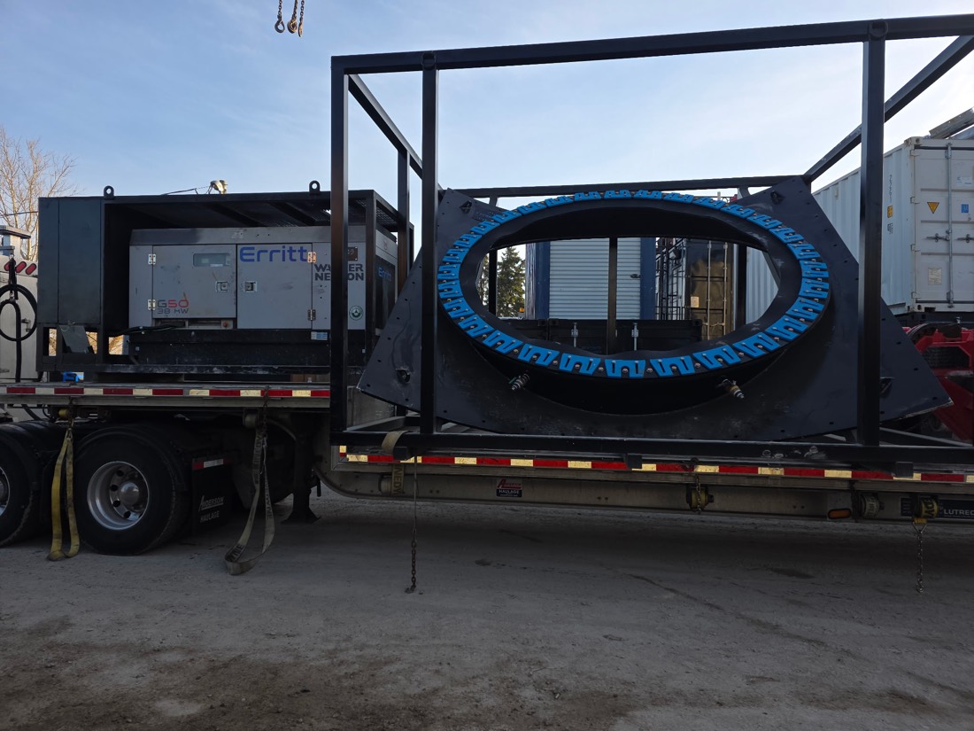 Mining flotation cell rotor / rubber-lined disc inside transport frame on flatbed