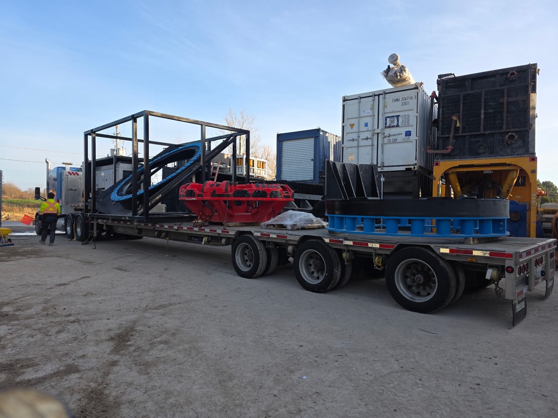 Multi-trailer load: mining flotation rotor in cage, red impeller hub, 20ft container, blue mill drive assembly
