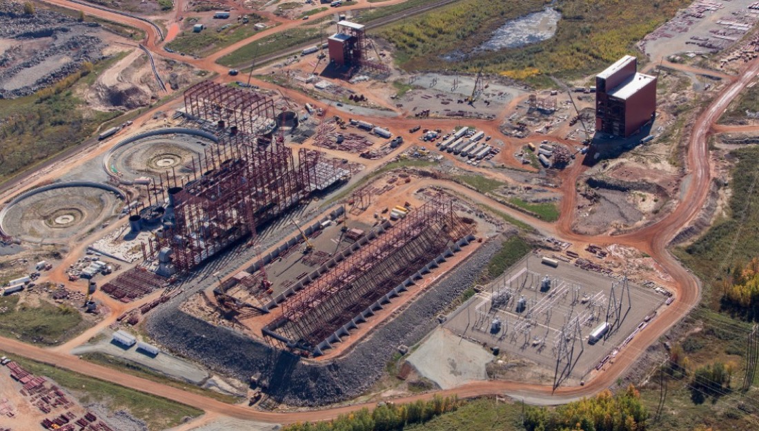 Aerial view of Essar mine site under construction — thickeners, processing buildings, substation