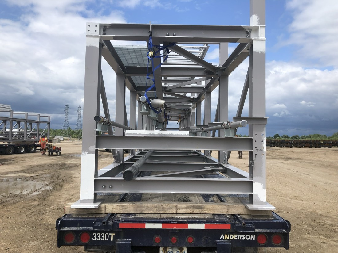 Rear view of structural steel skeleton on Anderson trailer at fab yard