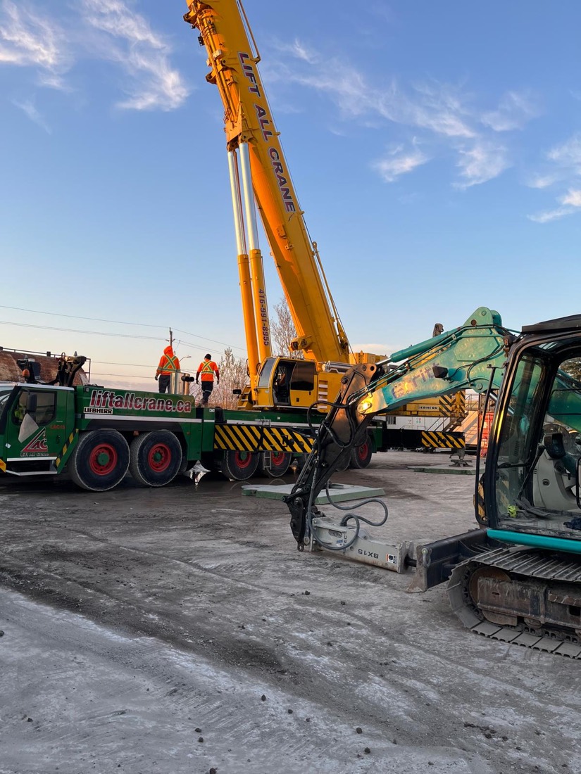 Lift All Crane Liebherr AT alongside excavator on prepared lay-down pad